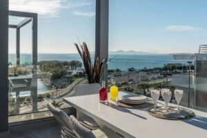 Ostrea Excelsior Apartment C2 dining terrace with sea and Athens Riviera view, Urban Suites Alimos Athens